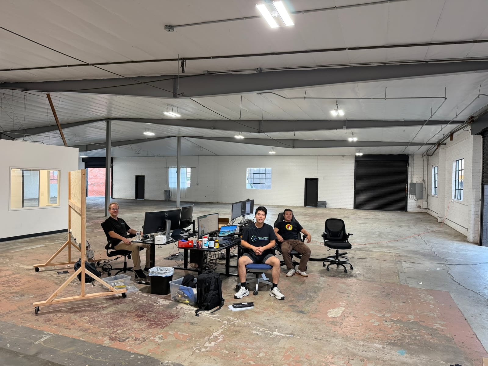 Neuron team members at their desks inside the new Gardena workspace.
